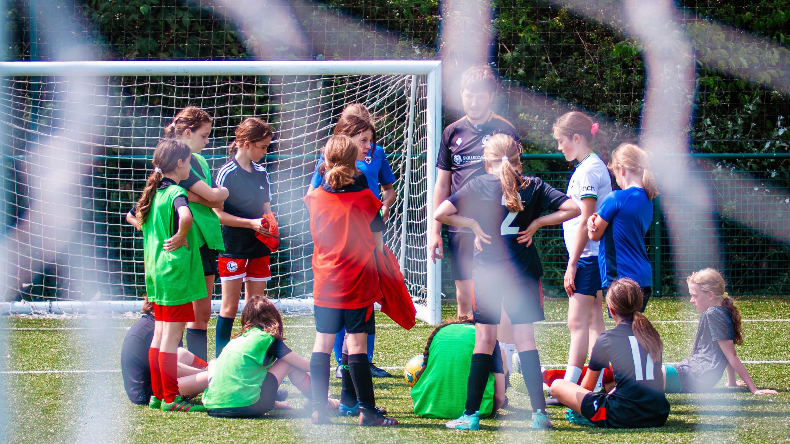 Girls playing football